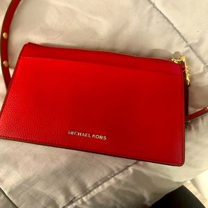 BRAND NEW Michael Kors leather crossbody in color crimson.